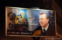 Курьезы рекламы: cпортсмен в маске стреляет в Януковича(фото)