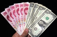 Китайский юань поставил новый рекорд по отношению к доллару 