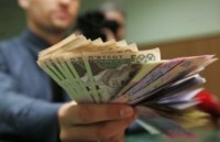 Гривна или доллар: Эксперты рассказали, в чем украинцам хранить сбережения в 2013 году 