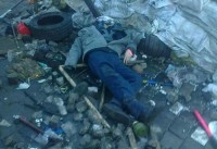 В Киеве на баррикадах лежат трупы убитых.