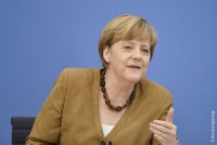 Меркель спохватилась и решила помочь Украине